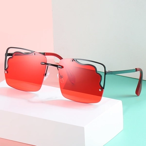 Fashionable rimless square sunglasses with red wavy ocean lenses and black metal frame