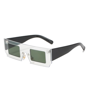 Futuristic square transparent sunglasses with dark green lenses and bold black temples