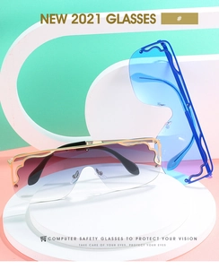 Flat top oversized retro sunglasses with gradient lenses on display stand