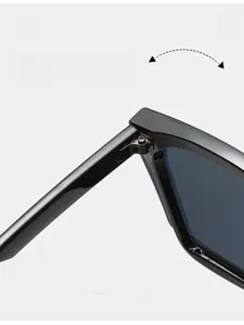 Macro detail of durable metal hinge on black cat-eye sunglasses for long-lasting use