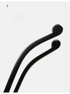 Close-up of ergonomic black cat-eye sunglasses temple tips for comfortable fit