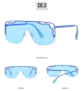 Detailed views of blue oversized rimless sunglasses with unique wavy lens edges