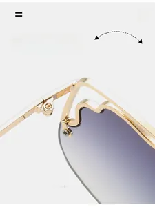 Detailed close-up of durable golden metal hinge and purple gradient lens on sunglasses