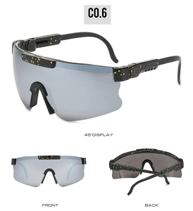 Three-angle view of black sports sunglasses with yellow splatter texture and grey lenses