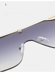 Detail view of comfortable silicone nose pads and gradient lenses on oversized sunglasses