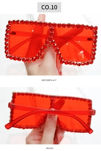 Detail view of red rhinestone embellished sunglasses with 45-degree and back angles