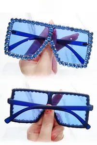 Detail of oversized blue rhinestone square sunglasses with a 45-degree and back view