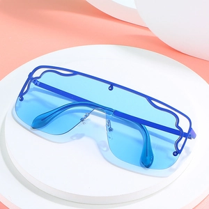 Flat top blue shield sunglasses with wave frame design and reflective lenses on a pedestal