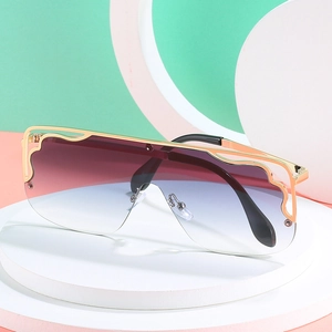 Flat top oversized vintage sunglasses with purple gradient lenses and gold metal beam