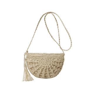 Beige hollow crochet half-moon crossbody straw bag with woven strap and long side tassels
