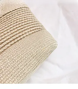 Detailed macro view of woven straw material with elegant striped pattern and hollow craft