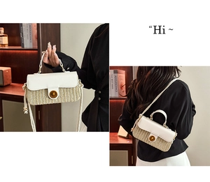 Detail of woven straw bag with white leather flap and brown circular twist lock closure