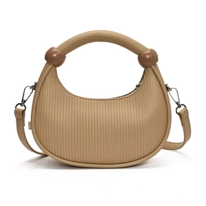 Khaki crescent handbag with vertical textures and distinctive spherical bead accents