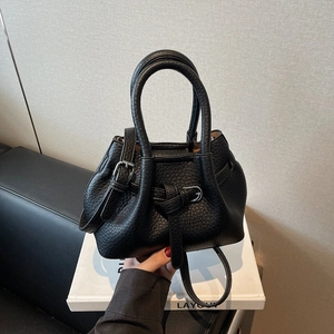 Fashionable black lychee grain leather handbag with bucket shape and shoulder strap