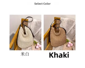 Detail view of woven hobo shoulder bags in off-white and khaki colors with leather straps