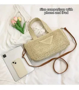 Close-up of woven straw handbag showing size comparison with iPad and smartphone