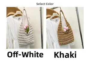 Detail view of woven shoulder bags in off-white and khaki colors with floral decor