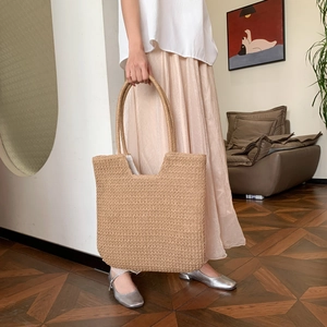 Handwoven khaki straw tote bag for women featuring V-shaped texture and large capacity