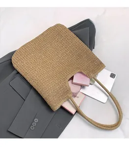 Top view of handmade straw tote bag showing large capacity for tablet and cosmetics