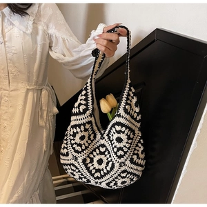Handmade crochet granny square flower tote bag with thick cotton straps in black and white