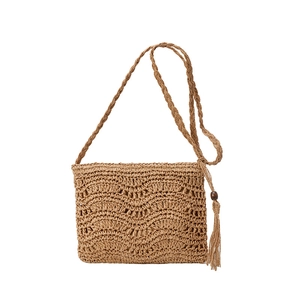 Handwoven straw shoulder bag with scalloped knit pattern and wooden bead tassel decor