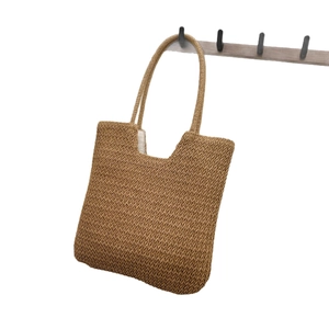 Handmade woven straw tote bag with V-pattern texture and crossbody strap for women