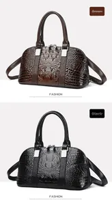 Details glänzender Handtaschen mit Krokodilprägung in Braun und Schwarz mit Metallteilen