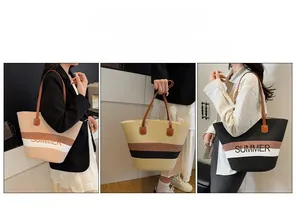 Detail showing straw tote bags with SUMMER embroidery in beige, black and mixed colors