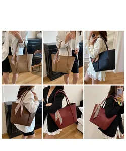 Model display of fashion tote bags in multiple colors with silk scarf decoration