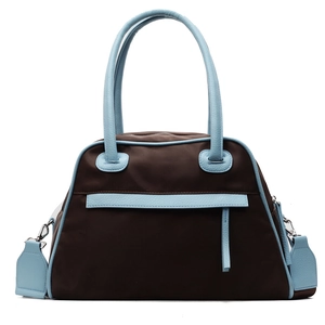 Large travel tote bag in brown and light blue color-block design with dual handles