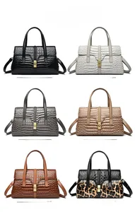 Detailed view of crocodile pattern texture and animal print options for large tote bag