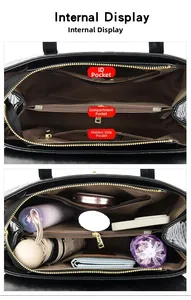 Detailed view of the black tote bag interior with multiple compartments and high capacity