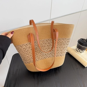 Large capacity straw tote bag with three-tier woven pattern and brown leather handles