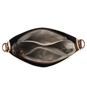 Interior view of large leather bucket bag showing organized compartments and lining