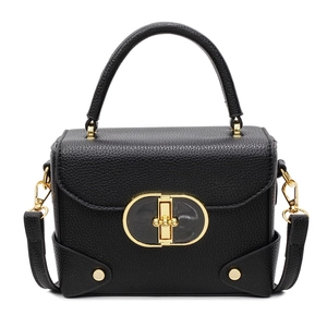 Classic black top-handle bag with gold hardware lock and pebble grain leather finish