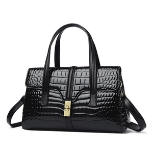 Large black crocodile embossed crossbody bag with gold lock for casual daily style