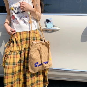 Straw shoulder bag with Sunny embroidery and yellow flowers for beach and summer travel