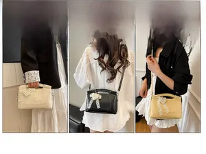 Three-way carry view of a leather bag showing handbag, crossbody, and shoulder styles