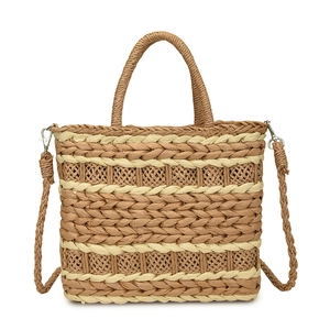 Straw woven handbag in beige and brown color block with round handles and crossbody strap