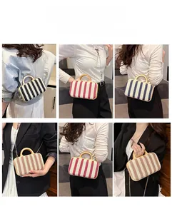 Detail showing various carrying styles and color options for striped straw bags