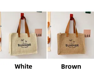 Detail of woven straw tote bags with summer coconut tree prints in white and brown