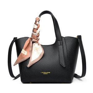 Chic black lychee grain leather bucket bag with silk scarf handle and golden logo