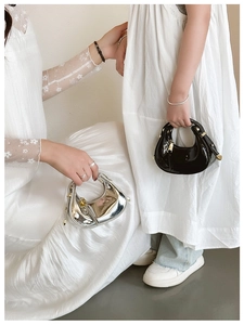 Chic mini crescent moon handbag in silver metallic and black patent leather finish