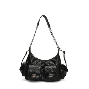 Classic black quilted chain shoulder bag with silver hardware and motorcycle style vibe