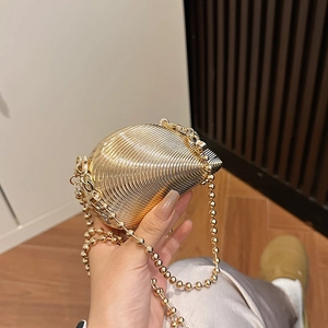 Elegant gold shell-shaped acrylic evening bag with beaded chain for formal dinner parties