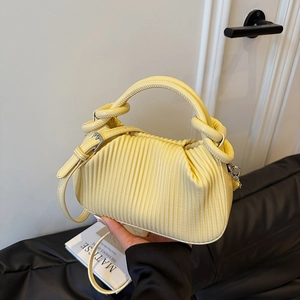 Chic yellow pleated tote bag with cylindrical handles and adjustable crossbody strap