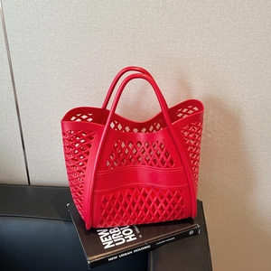 Sac à main rouge transparent ajouré avec motifs géométriques et doubles anses rondes