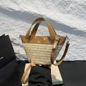 Fashion woven bucket bag with brown leather contrast and adjustable crossbody strap