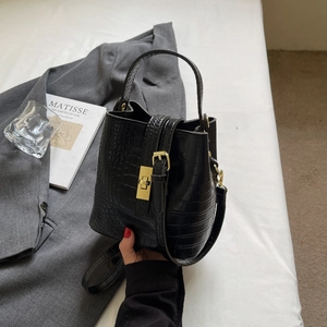 Classic black crocodile texture bucket bag with gold hardware and removable shoulder strap