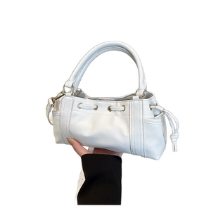 Minimalist white faux leather handbag with drawstring and shoulder strap for daily use